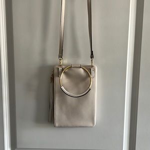 Off-white purse with long strap and short handle